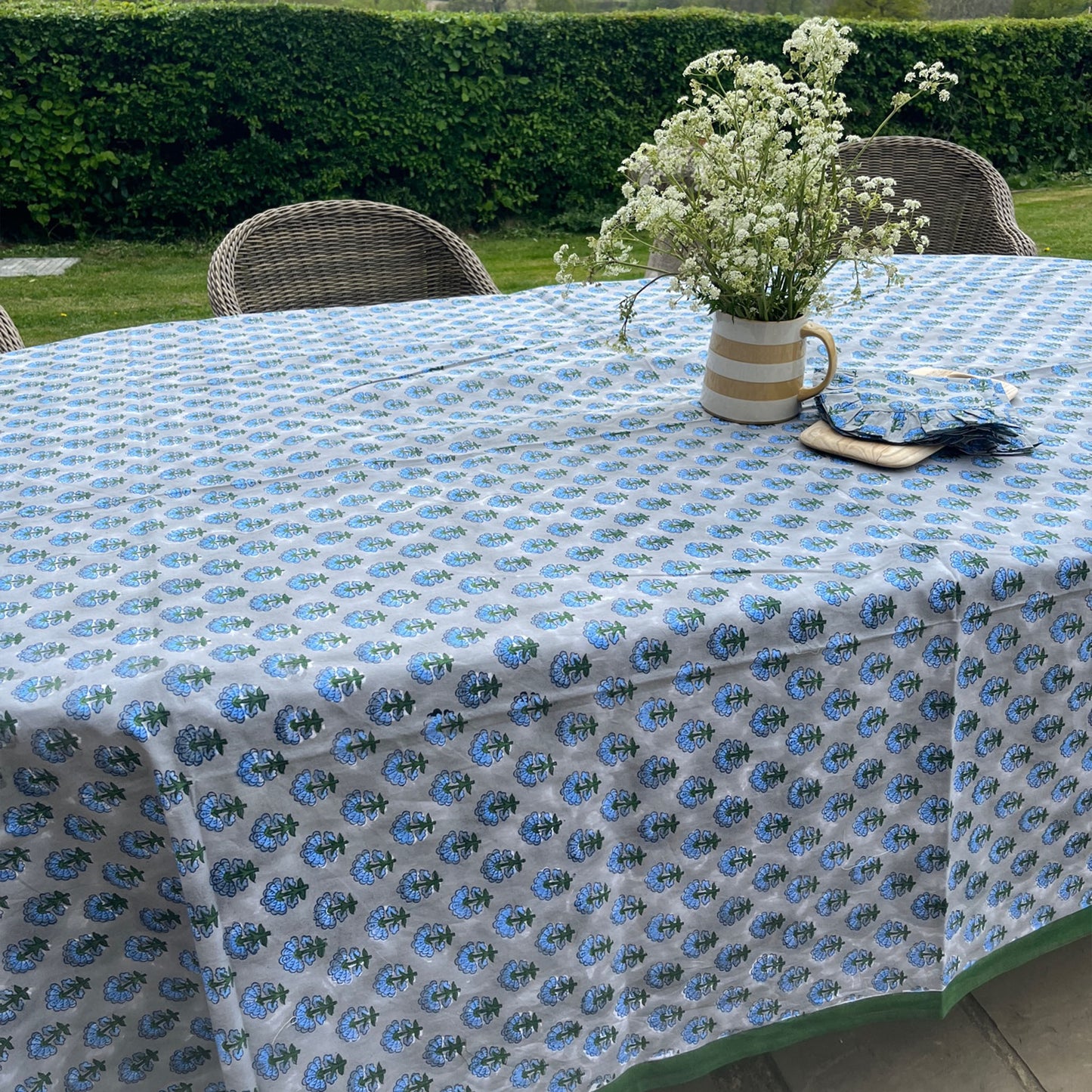 Kitty block printed table cloth - Pale grey with cornflower blue and dark green flowers