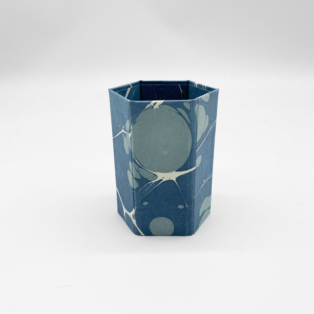 
                  
                    Marbled Paper Hexagonal Pen Pot - Blue Planet
                  
                