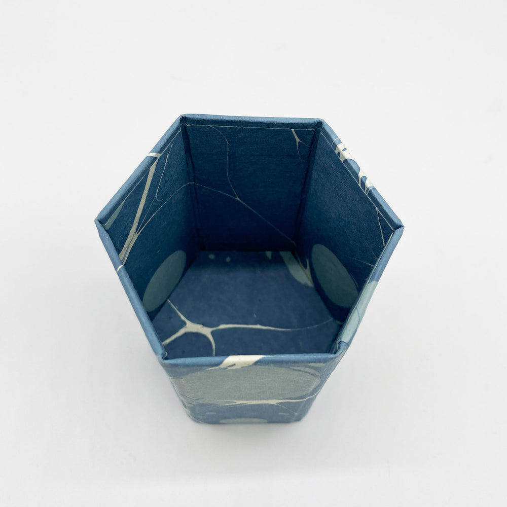 
                  
                    Marbled Paper Hexagonal Pen Pot - Blue Planet
                  
                