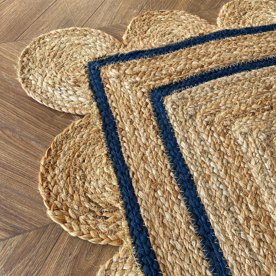 Scallop Edged Jute Rug with a Navy Blue Border